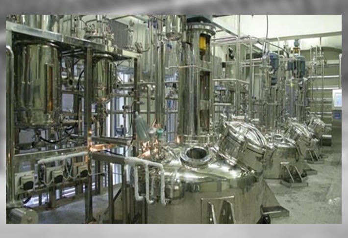 Process reactors in a chemical plant hall